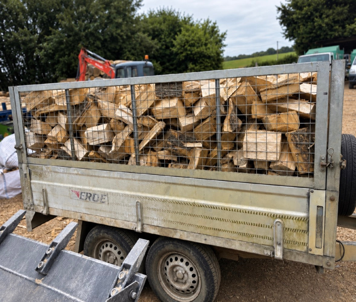 Loose tipped seasoned hardwood logs per m3